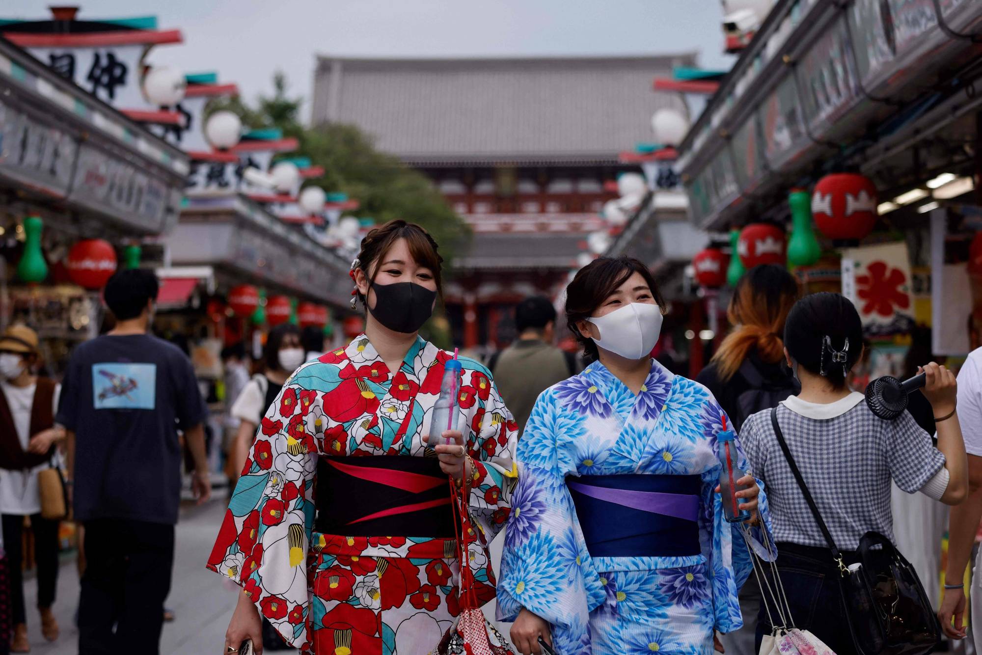 Visitors near Sensoji temple in Tokyo's Asakusa district on Thursday. | AFP-JIJI