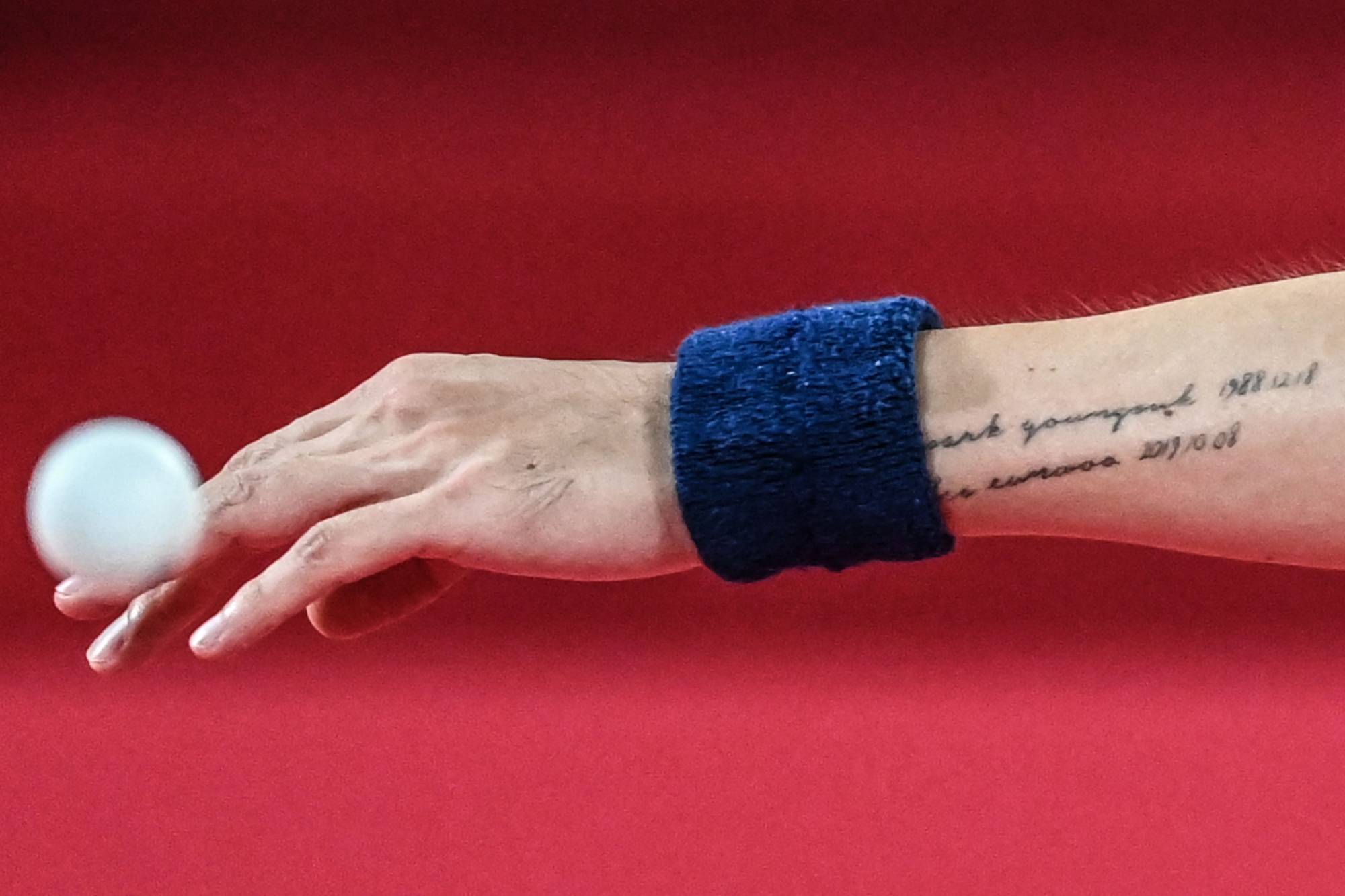 A tattoo on the arm of South Korean table tennis athlete Lee Sang-su  | AFP-JIJI