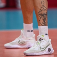 A tattoo on the leg of French volleyball player Nicolas le Goff  | AFP-JIJI