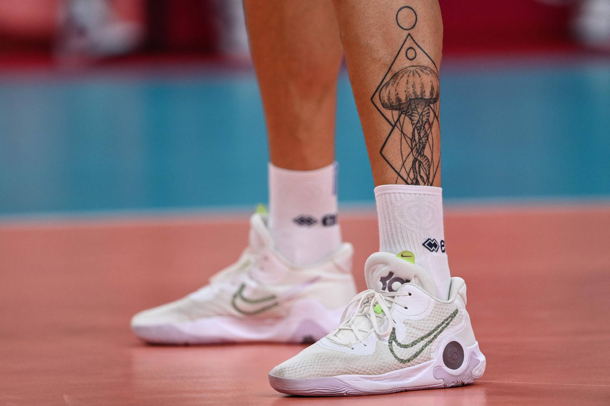A tattoo on the leg of French volleyball player Nicolas le Goff  | AFP-JIJI