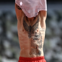 The tattoos of Polish runner Marcin Lewandowski  | AFP-JIJI