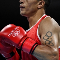 The Olympics rings tattoo of Moroccan boxer Abdelhaq Nadir | AFP-JIJI