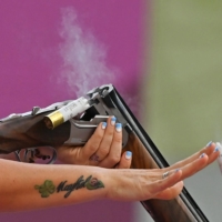 A tattoo on the arm of women\'s trap athlete Alessandra Perilli  San Marino | AFP-JIJI