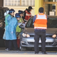 A drive-thru COVID-19 vaccination station in Canberra on Friday  | BLOOMBERG 