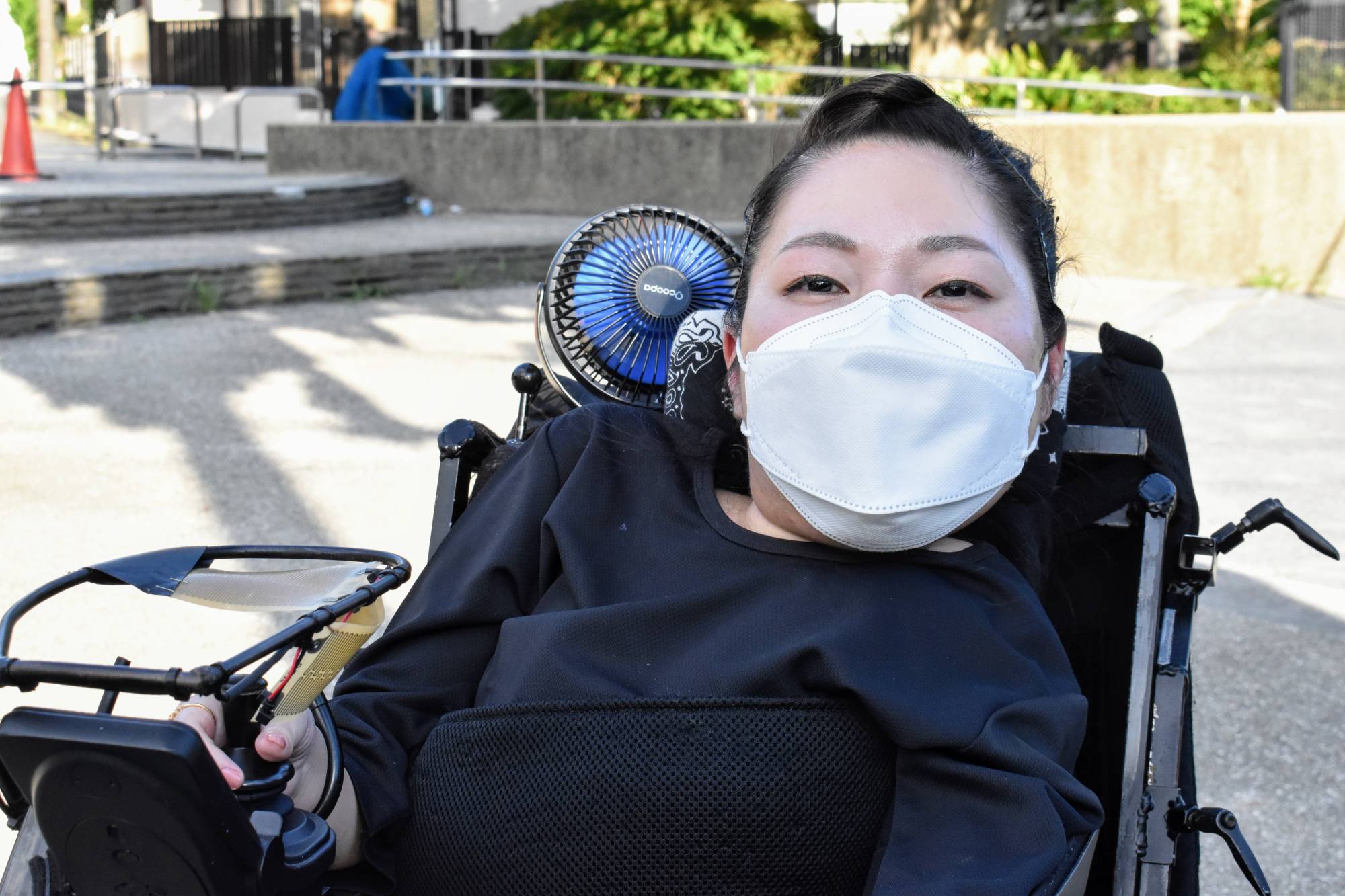 Mari Nagaoka, a power wheelchair soccer player in Yokohama, confesses to mixed feelings about the Paralympics. | TOMOHIRO OSAKI