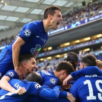 Chelsea players cerebrate after a goal during the UEFA Champions League Final against Manchester City in Porto, Portugal, in May.  | GETTY IMAGES / VIA BLOOMBERG 