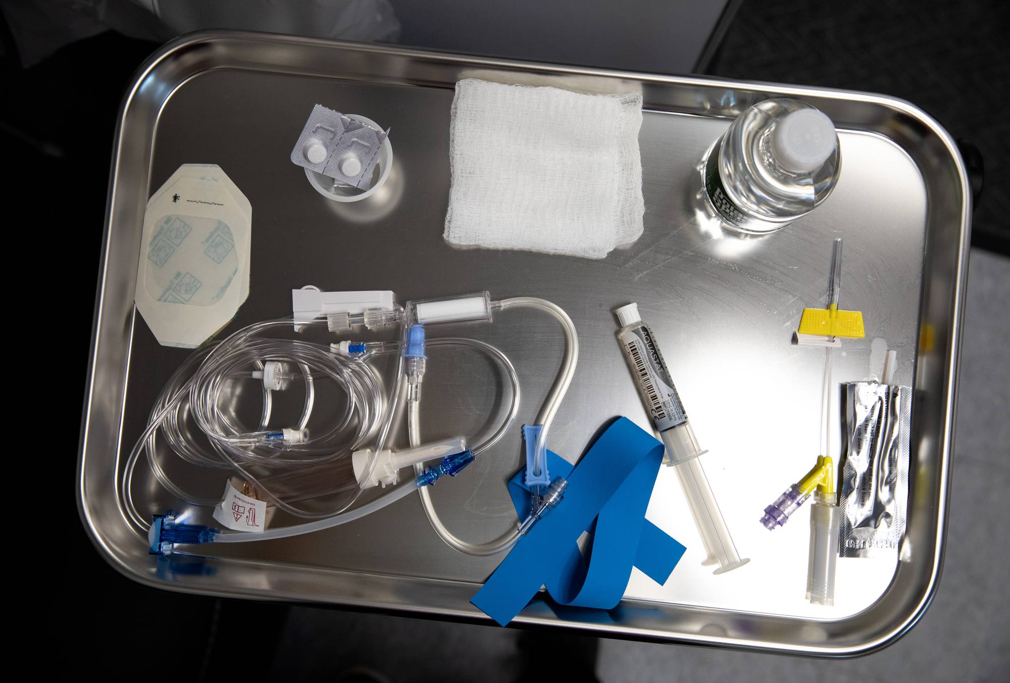 Medical supplies are used to administer the REGEN-COV monoclonal antibody treatment at a UMass Memorial Health clinic in Worcester, Massachusetts, on Friday. | BLOOMBERG