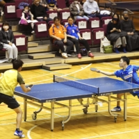 Para men\'s table tennis player Koyo Iwabuchi (right) plays in the Iwabuchi Open, which he organized, in November 2020 in Tokyo. | KYODO