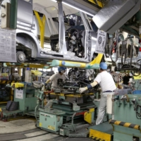 Japan\'s machinery orders declined in June from the previous month, but the Cabinet Office has maintained its assessment that the orders are showing \"signs of picking up.\" | BLOOMBERG