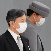 Emperor Naruhito, left, and Empress Masako attend a memorial service marking the 76th anniversary of the end of World War II in Tokyo on Sunday. | BLOOMBERG