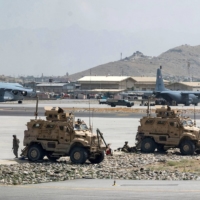 U.S. Army soldiers patrol Hamid Karzai International Airport in Kabul on Tuesday, 2021 | U.S. AIR FORCE / VIA REUTERS  