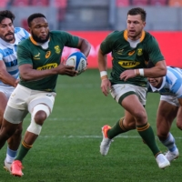 South Africa center Lukhanyo Am runs with the ball during a Rugby Championship match between the Springboks and Argentina on Saturday in Gqeberha (formerly Port Elizabeth), South Africa. | AFP-JIJI