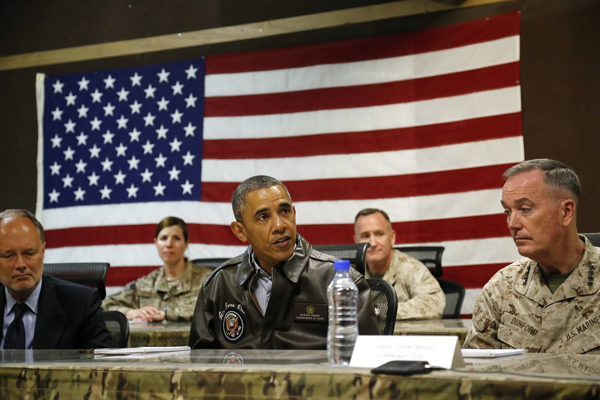U.S. President Barack Obama visits Bagram Air Base near Kabul in May 2014. Obama inherited the war in Afghanistan, but he also supported it to balance out his opposition to the war in Iraq when he was running for office. | REUTERS