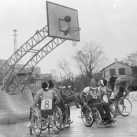 Japan plays the United States in a wheelchair basketball game at the 1964 Tokyo Paralympics. | KYODO