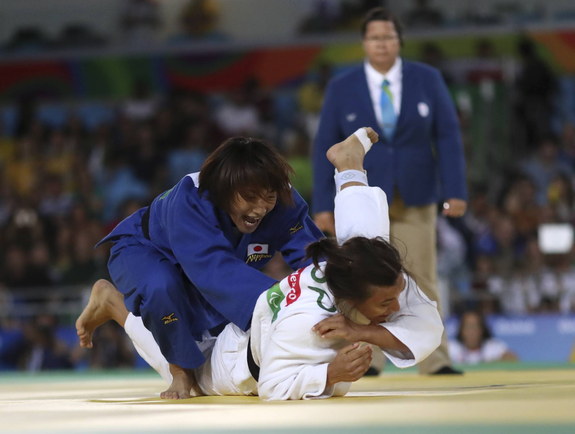 Junko Hirose (left) competes against Spain's Maria Monika Merenciano Herrero during the 2016 Rio Games. | REUTERS