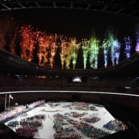 Colorful fireworks representing the colors of the Paralympic symbol light up the sky above the National Stadium during the opening ceremony of the 2020 Tokyo Paralympics.  | DAN ORLOWITZ
