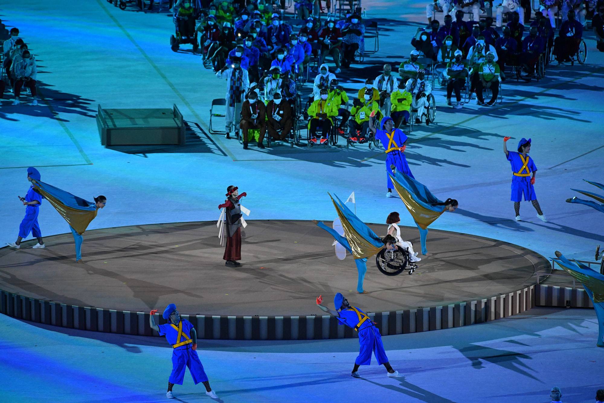 A scene from the opening ceremony performance, which centered on the quest of the 'Little One-Winged Plane' to fly. | DAN ORLOWITZ 