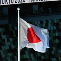 The Japanese flag is raised on the stadium mast | DAN ORLOWITZ
