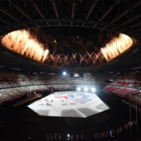 Fireworks explode above the National Stadium during the opening ceremony. | DAN ORLOWITZ
