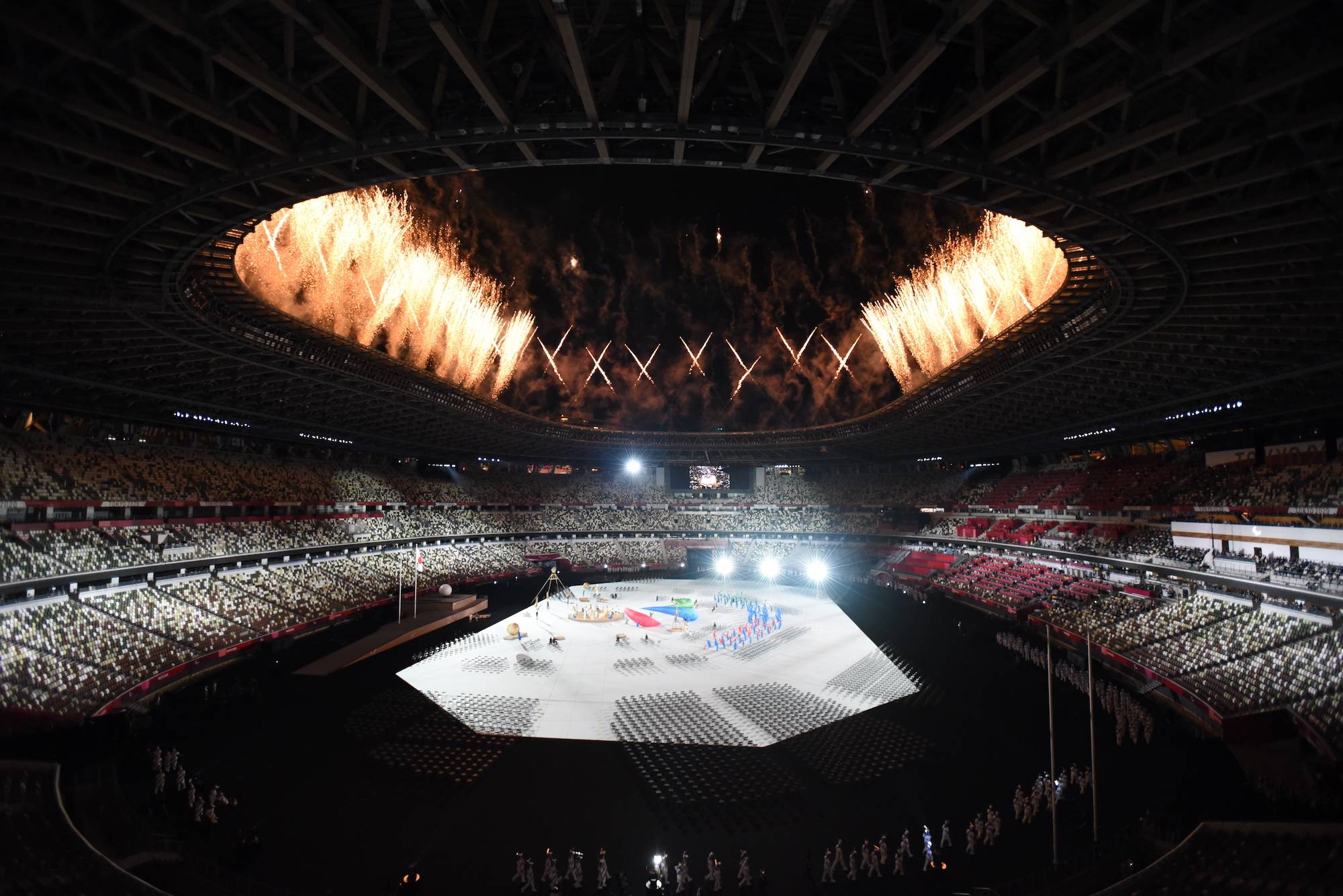 Fireworks explode above the National Stadium during the opening ceremony. | DAN ORLOWITZ 
