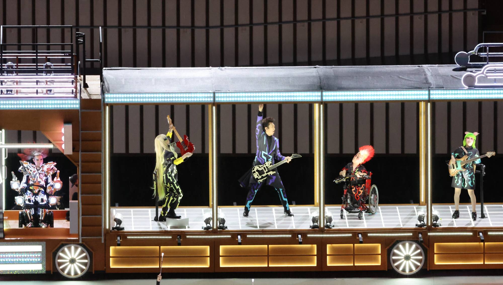 Japanese guitar legend Tomoyasu Hotei performs aboard the Dazzling Truck | REUTERS