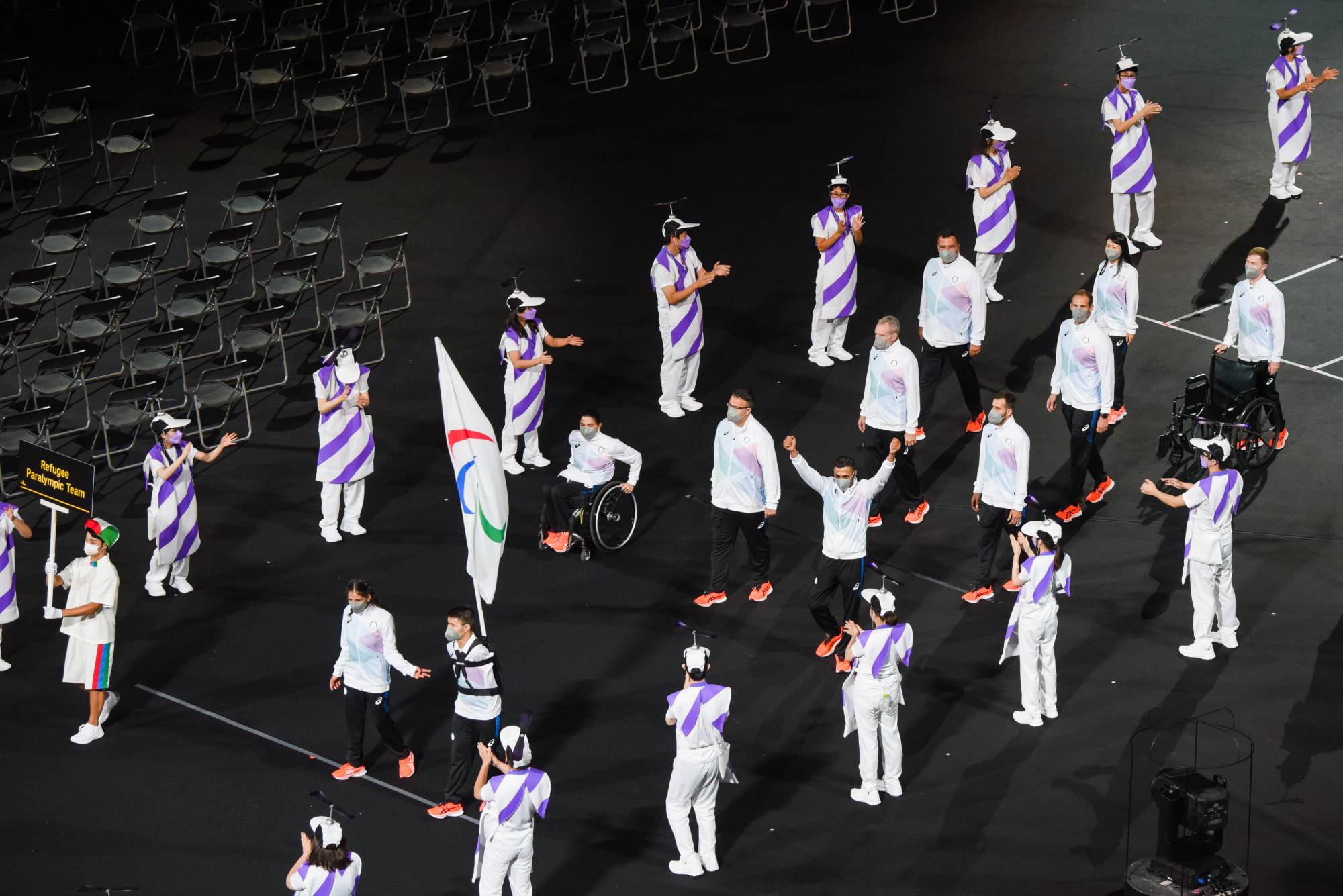 The Refugee Olympic Team enter the stadium | BLOOMBERG