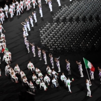 Italy\'s team arrives at the opening ceremony for the Tokyo 2020 Paralympic Games | AFP-JIJI