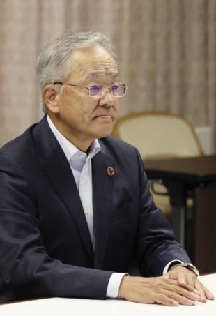 Toyoaki Nakamura, a member of the Bank of Japan's Policy Board, during a virtual meeting with business leaders of Miyazaki Prefecture on Wednesday | KYODO