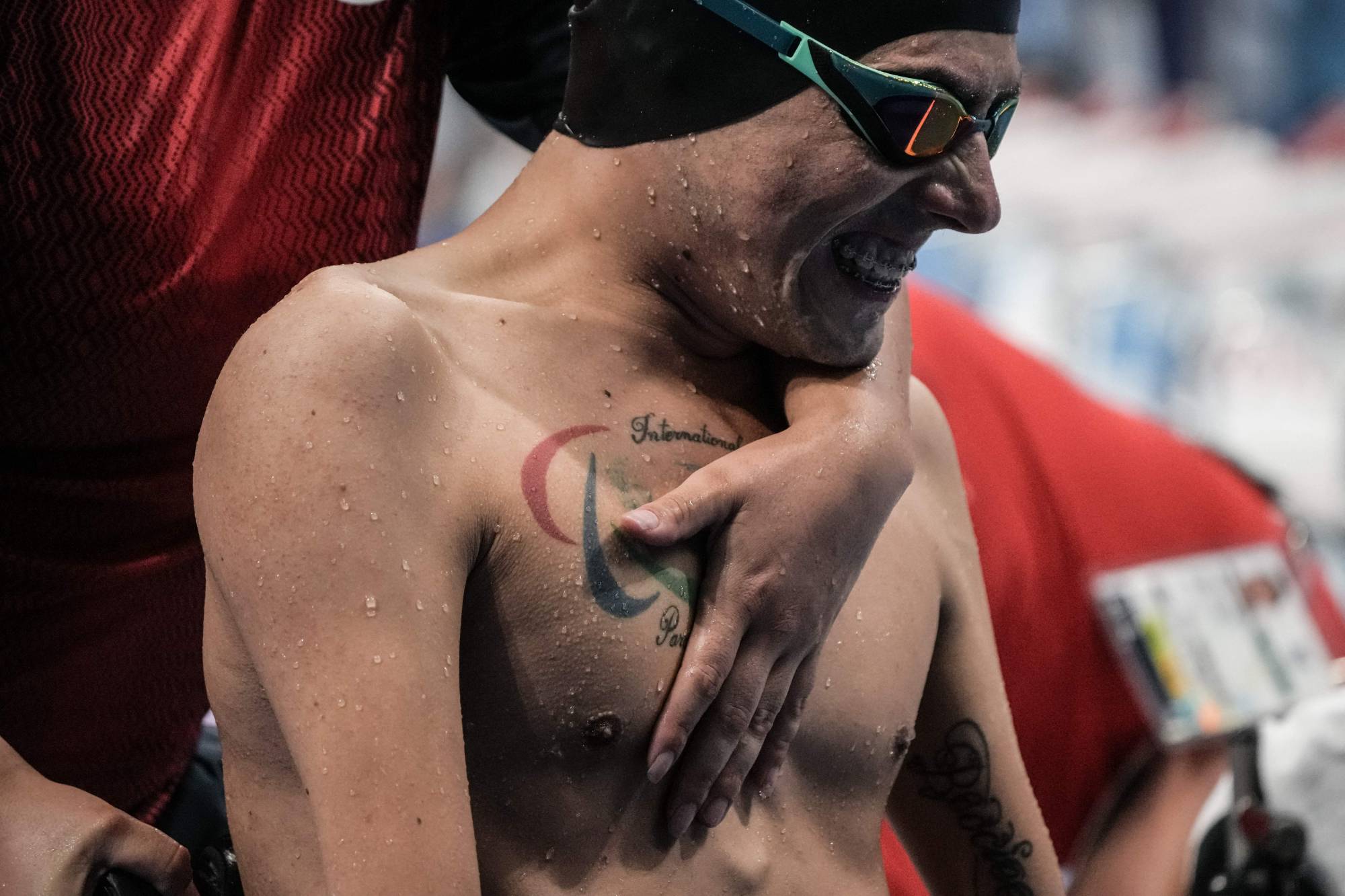 Chile's Alberto Abarza reacts afterwinning the final of men's 100-meter backstroke (S2) | AFP-JIJI