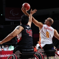 South Korea\'s Dong Hyeon Gim in action against Spain\'s Alejandro Zarzuela Beltran during their preliminary match of men\'s wheelchair basketball | REUTERS