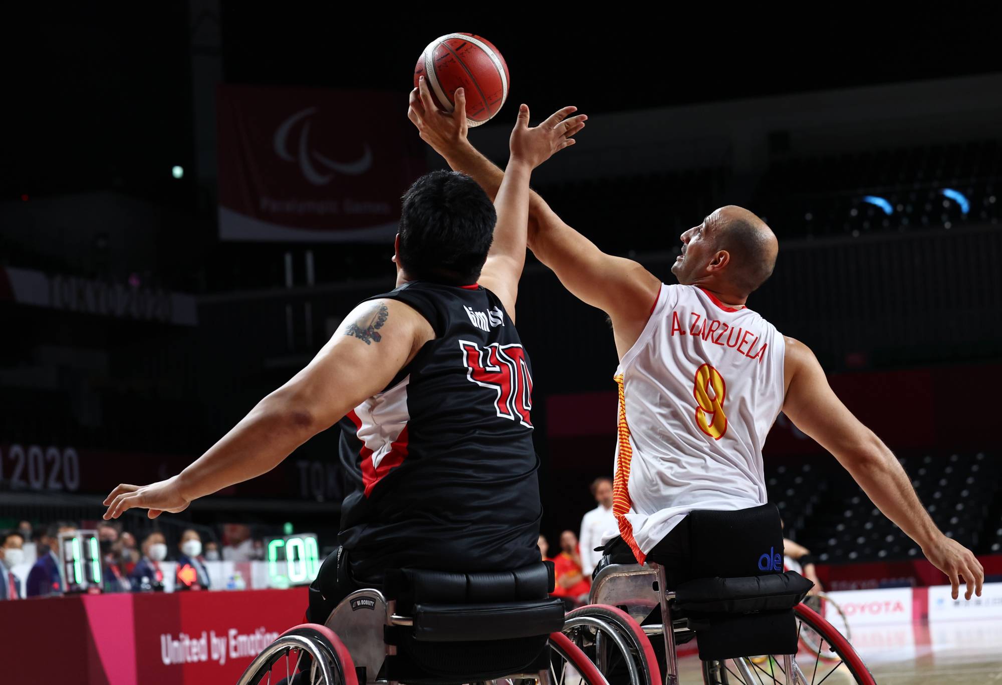 South Korea's Dong Hyeon Gim in action against Spain's Alejandro Zarzuela Beltran during their preliminary match of men's wheelchair basketball | REUTERS
