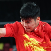 Shuai Zhao of China in action against Gyula Zborai of Hungary  | REUTERS