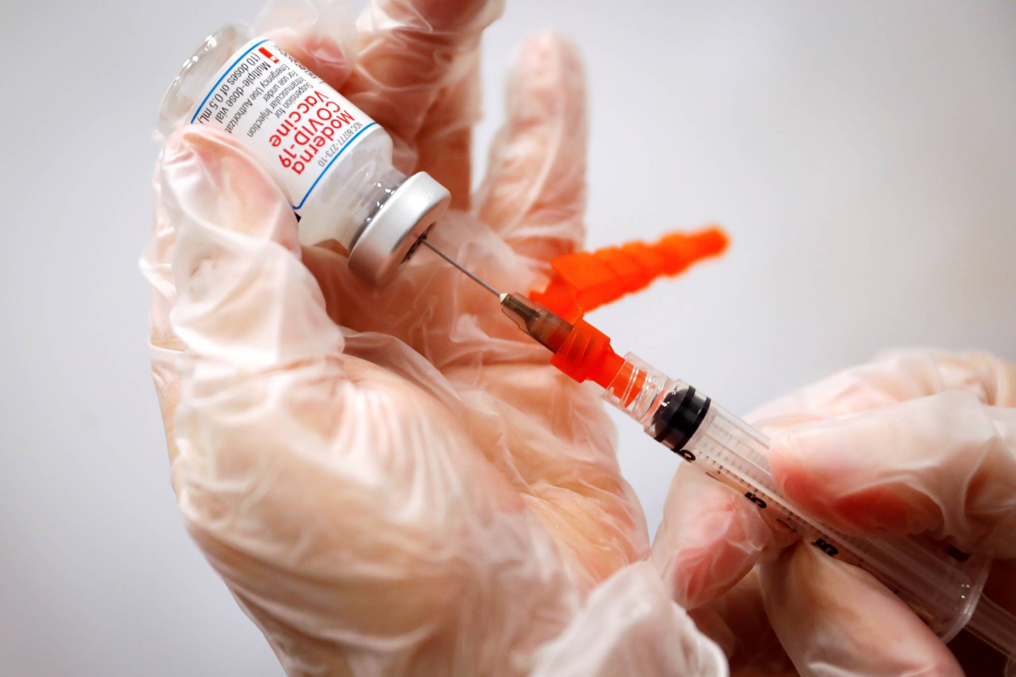 Drugmaker Takeda Pharmaceutical Co. has suspended use of around 1.63 million doses of Moderna Inc.'s COVID-19 vaccine as a precaution after foreign materials were found in some vials. | REUTERS