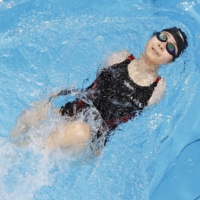 Miyuki Yamada finishes second in the women\'s 100-meter backstroke S2 final at the 2020 Tokyo Paralympics on Wednesday.  | KYODO