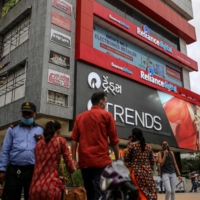 The Reliance Mall in Jamnagar, India. Reliance has said it will make its operations carbon neutral by 2035 with the help of projects that offset emissions. | BLOOMBERG