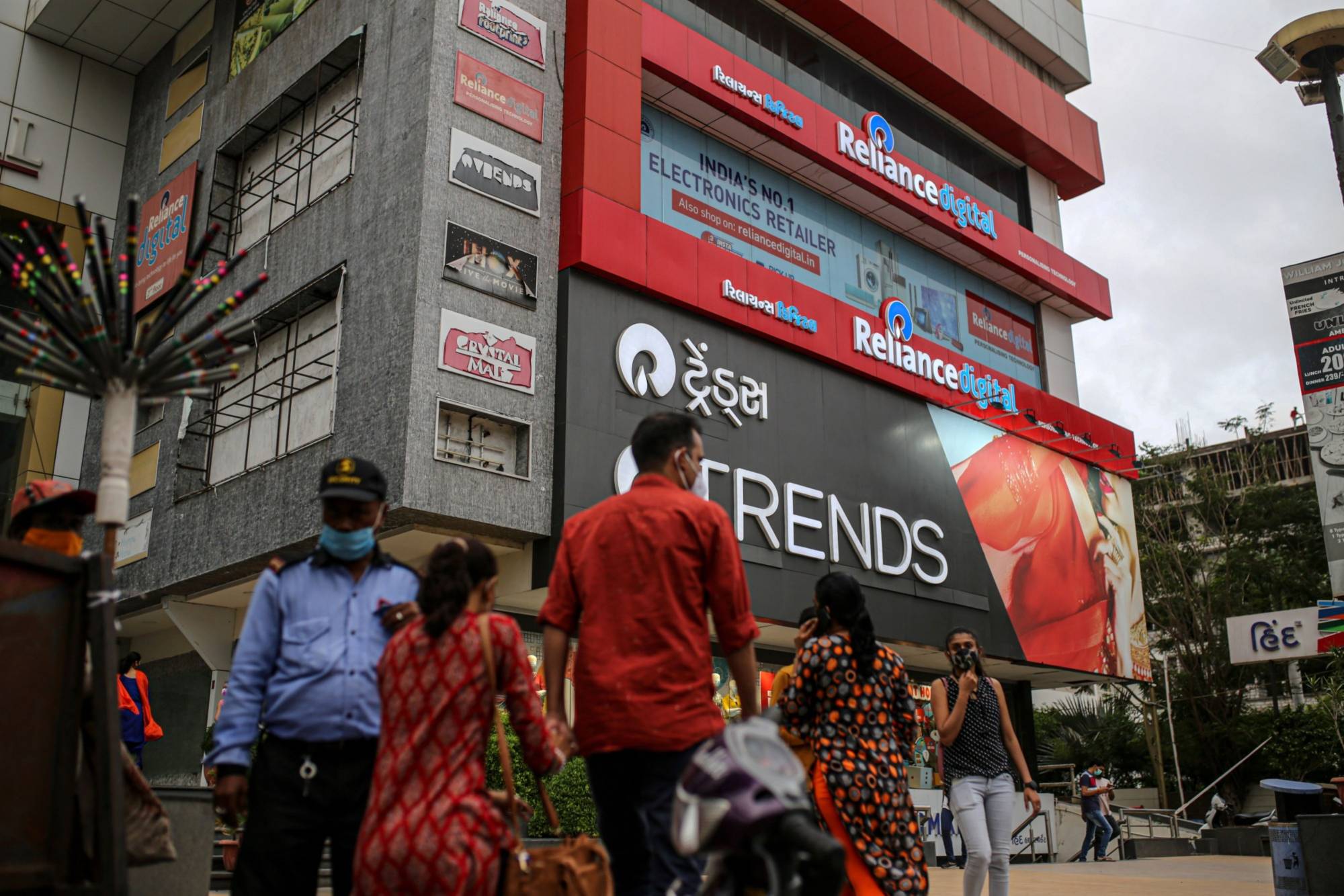The Reliance Mall in Jamnagar, India. Reliance has said it will make its operations carbon neutral by 2035 with the help of projects that offset emissions. | Bloomberg