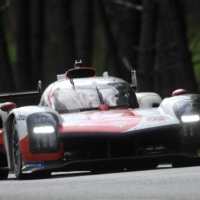 Japanese driver Kamui Kobayashi, in a Toyota TS050 Hybrid Hypercar, races during the Le Mans 24 Hours endurance race in Le Mans, France, on Sunday. | AFP-JIJI