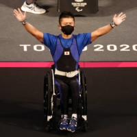 Hiroshi Miura of Japan after competing in the final of the men\'s under-49 kg powerlifting competition at Tokyo International Forum on Thursday.  | REUTERS