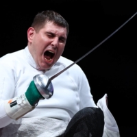 Russian Paralympic Committee\'s Alexander Kuzyukov reacts after winning against Brazil\'s Jovane Guissone in men\'s wheelchair fencing epee individual  | REUTERS