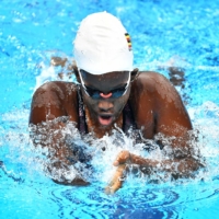 Uganda\'s Husnah Kukundakwe in a heat of the women\'s 100-meter breaststroke | AFP-JIJI