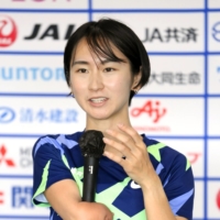 Sae Tsuji speaks during a media event in April.  | KYODO 