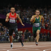 Germany\'s Heinrich Popow (right) reacts as he wins the men\'s 100-meter T42 final during the London 2012 Paralympics.  | REUTERS