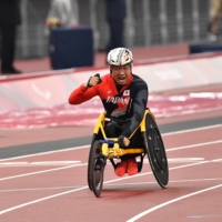 Tomoki Sato after winning the men\'s T52 400 meters Friday at National Stadium. | DAN ORLOWITZ
