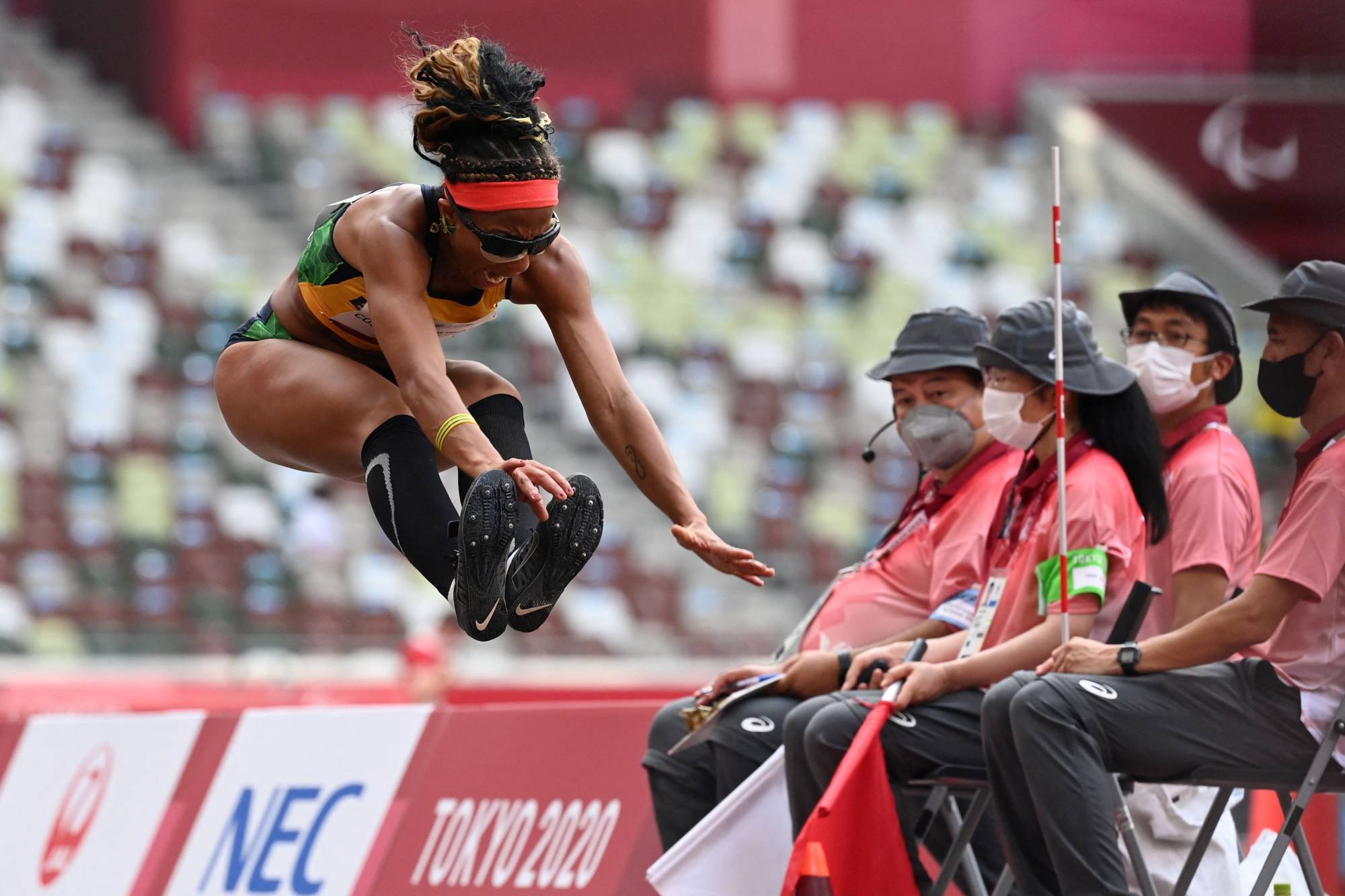 Brazil's Silvania Costa de Oliveira jumps in the women's long jump (T11) final competition | AFP-JIJI