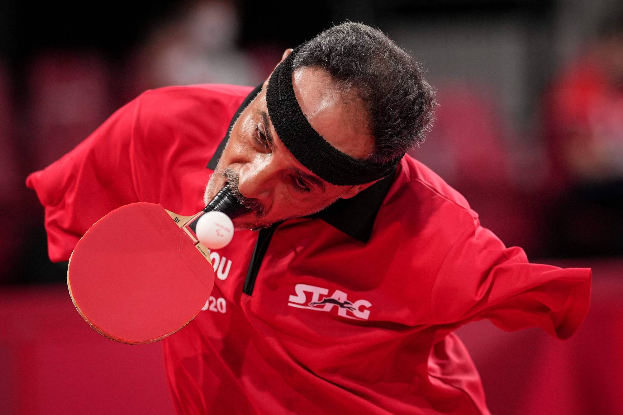 Egypt's Ibrahim Elhusseiny Hamadtou returns a ball during the men's table tennis singles (Class 6) match | AFP-JIJI