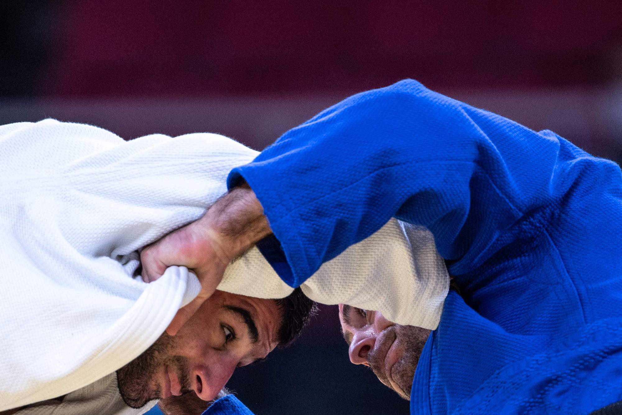 Azerbaijan's Namig Abasli competes with Ukraine's Davyd Khorava in the men's under-66 kg bronze medal | AFP-JIJI