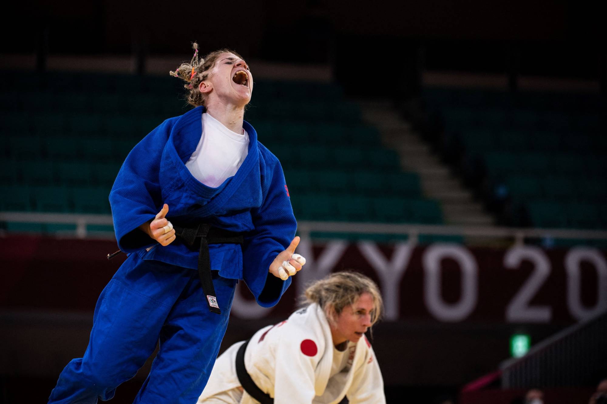 Algeria's Cherine Abdellaoui reacts after winning the women's under-52 kg judo final | AFP-JIJI
