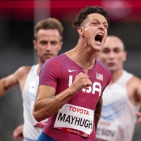Nick Mayhugh breaks the world record and wins gold in the men\'s 100-meter T37 final on Friday at National Stadium in Tokyo.  | OLYMPIC INFORMATION SERVICES / VIA AFP-JIJI