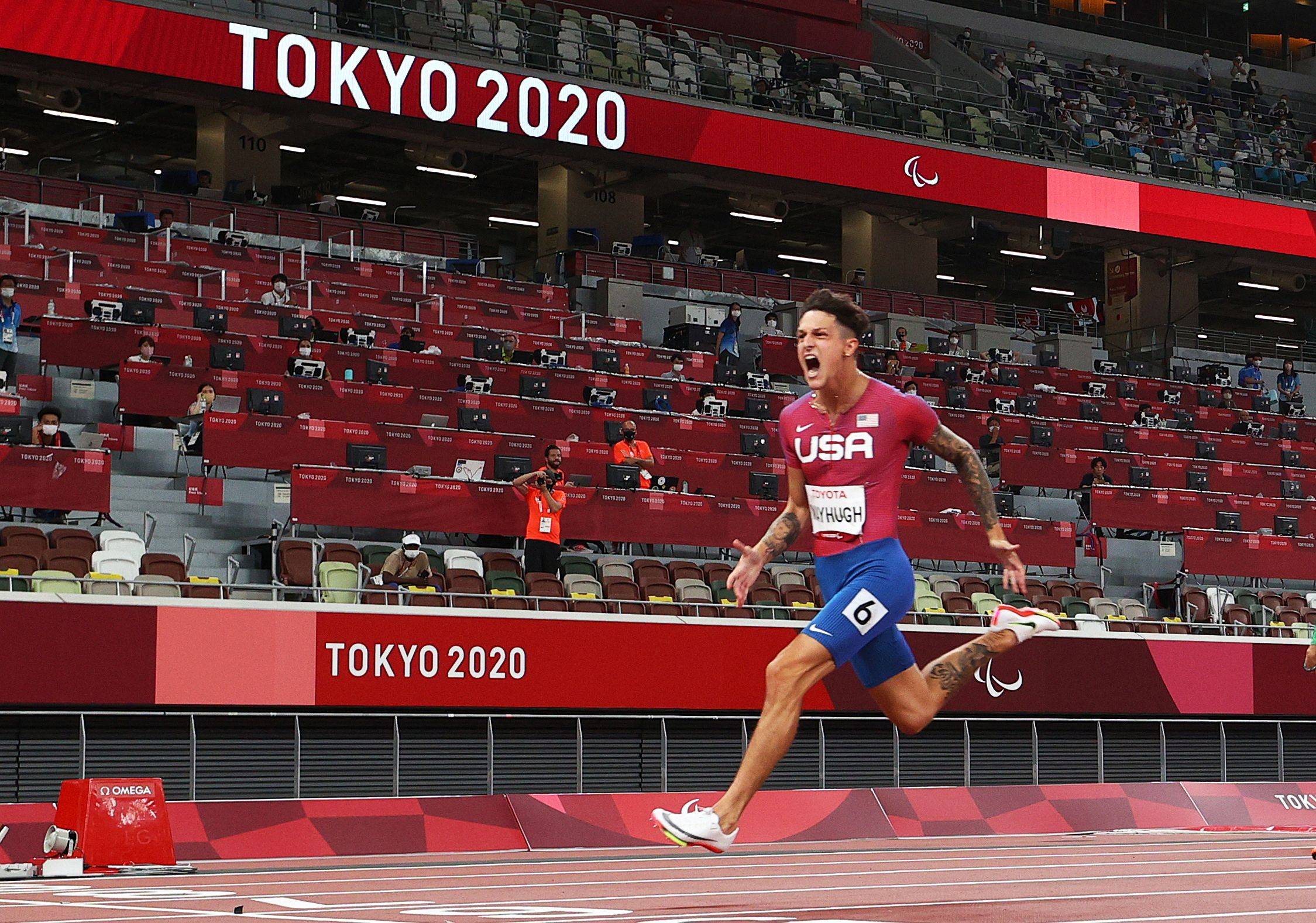 Nick Mayhugh of the United States reacts after winning gold and setting a new world record. | REUTERS