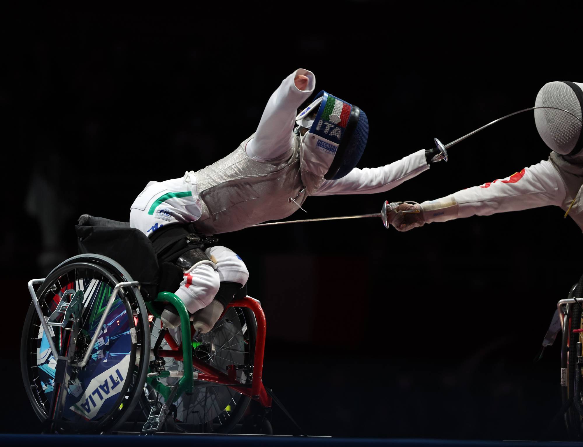 Vio in action against Zhou during their gold medal bout at Makuhari Messe in Chiba. | REUTERS
